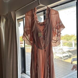 Free people pink dress with sleeves - size M
